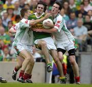 28 August 2005; Kieran Brennan, Kerry, in action against Peter Collins, right, and Ger Cafferkey, Mayo. Minor Football Championship Semi-Final, Kerry v Mayo, Croke Park, Dublin. Picture credit; Ray McManus / SPORTSFILE