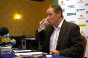 29 August 2005; Republic of Ireland Manager Brian Kerr takes a drink of water at a press conference to announce his squad for the World Cup Qualifier against France on 7th September. Citywest Hotel, Saggart, Dublin. Picture credit; Damien Eagers / SPORTSFILE