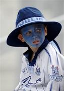 27 August 2005; A young Dublin supporter watches the game. TG4 Ladies Football All-Ireland Quarter-Final, Dublin v Tyrone, Croke Park, Dublin. Picture credit; Ray McManus / SPORTSFILE