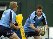 31 August 2005; Christian Warner is action against team-mate Eoghan Hickey during Leinster Rugby squad training. Old Belvedere, Anglesea Road, Dublin. Picture credit; Brendan Moran / SPORTSFILE
