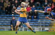 9 March 2014; Conor McGrath, Clare, scores his side's first goal despite the best efforts of Michael Cahill, Tipperary. Allianz Hurling League, Division 1A, Round 3, Tipperary v Clare, Semple Stadium, Thurles, Co. Tipperary. Picture credit: Brendan Moran / SPORTSFILE
