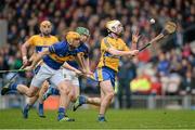 9 March 2014; Conor McGrath, Clare, in action against Shane McGrath, left, and Cathal Barrett, Tipperary. Allianz Hurling League, Division 1A, Round 3, Tipperary v Clare, Semple Stadium, Thurles, Co. Tipperary. Picture credit: Brendan Moran / SPORTSFILE