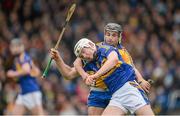 9 March 2014; Brendan Maher, Tipperary, is tackled by Cathal O'Connell, Clare. Allianz Hurling League, Division 1A, Round 3, Tipperary v Clare, Semple Stadium, Thurles, Co. Tipperary. Picture credit: Brendan Moran / SPORTSFILE