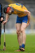9 March 2014; Darach Honan, Clare, leaves the pitch with an injury during the first half. Allianz Hurling League, Division 1A, Round 3, Tipperary v Clare, Semple Stadium, Thurles, Co. Tipperary. Picture credit: Brendan Moran / SPORTSFILE
