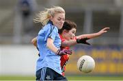 9 March 2014; Nicole Owens, Dublin, in action against Maire Ambrose, Cork. Tesco Homegrown Ladies National Football League Division 1 Round 5, Dublin v Cork, Parnell Park, Dublin. Picture credit: Pat Murphy / SPORTSFILE