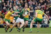 9 March 2014; Dalton McDonagh, Meath, in action against Mark McHugh and Neil Gallagher, Donegal. Allianz Football League Division 2 Round 4, Donegal v Meath, MacCumhaill Park, Ballybofey, Co. Donegal. Picture credit: Oliver McVeigh / SPORTSFILE