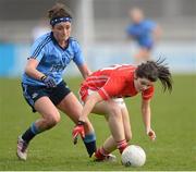 9 March 2014; Maire Ambrose, Cork, in action against Niamh McEvoy, Dublin. Tesco Homegrown Ladies National Football League Division 1 Round 5, Dublin v Cork, Parnell Park, Dublin. Picture credit: Pat Murphy / SPORTSFILE