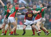 9 March 2014; Gavin Hoey, Westmeath, is surrounded by Mayo players, from left: Lee Keegan, Donal Vaughan, Seamus O'Shea, David Drake and Colm Boyle. Allianz Football League Division 1 Round 4, Westmeath v Mayo, Cusack Park, Mullingar, Co. Westmeath. Photo by Sportsfile