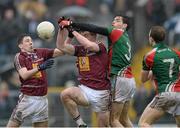 9 March 2014; Lee Keegan, left, and Jason Doherty, Westmeath, in action against Kieran Gavin, Mayo. Allianz Football League Division 1 Round 4, Westmeath v Mayo, Cusack Park, Mullingar, Co. Westmeath. Photo by Sportsfile