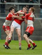 9 March 2014; Andrew O'Sullivan, Cork, in action against Kevin Johnston, left, and Fergal Doherty, Derry. Allianz Football League, Division 1, Round 4, Cork v Derry, Pairc Ui Rinn, Cork. Picture credit: Diarmuid Greene / SPORTSFILE