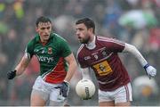 9 March 2014; Paul Sharry, Westmeath, in action against Jason Doherty, Mayo. Allianz Football League Division 1 Round 4, Westmeath v Mayo, Cusack Park, Mullingar, Co. Westmeath. Photo by Sportsfile