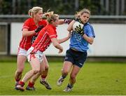 9 March 2014; Noelle Healy, Dublin, in action against Angela Walsh, left, and Briege Corkery, Cork. Tesco Homegrown Ladies National Football League Division 1 Round 5, Dublin v Cork, Parnell Park, Dublin. Picture credit: Pat Murphy / SPORTSFILE