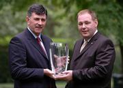 30 August 2005; Legend of Roscommon Gaelic Football from the 1960s, 70s and 80s Dermot Earley, who was today inducted into the MBNA Kick Fada Hall of Fame, with David Mooney, right, Strategy and Partnership Manager, MBNA. The 2005 MBNA Kick Fada All-Ireland will be hosted by Bray Emmets on 17th September. MBNA, St. Stephens Green, Dublin. Picture credit; David Maher / SPORTSFILE
