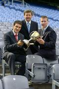 30 August 2005; All-Ireland finalists Tom Kenny of Cork, left, and Damien Hayes of Galway, right, with Billy Finn, General Manager of AIB, at the launch of the AIB Kilmacud Crokes All-Ireland Hurling 7's which will take place on 10th September. Croke Park, Dublin. Picture credit; Brendan Moran / SPORTSFILE