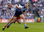 27 August 2005; Barry Cahill, Dublin, in action against Brian McGuigan, Tyrone. Bank of Ireland All-Ireland Senior Football Championship Quarter-Final Replay, Dublin v Tyrone, Croke Park, Dublin. Picture credit; David Maher / SPORTSFILE
