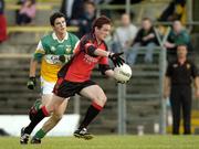 27 August 2005; Kevin Duffin, Down, in action against Richie Dalton, Offaly. Minor Football Championship Semi-Final, Down v Offaly, Pairc Tailteann, Navan, Co. Meath. Picture credit; Pat Murphy / SPORTSFILE