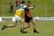 27 August 2005; James Colgan, Down, in action against Connor Mahon, Offaly. Minor Football Championship Semi-Final, Down v Offaly, Pairc Tailteann, Navan, Co. Meath. Picture credit; Pat Murphy / SPORTSFILE