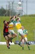 27 August 2005; Martin Clarke, Down, in action against Richie Dalton and Pauric Duffy, right, Offaly. Minor Football Championship Semi-Final, Down v Offaly, Pairc Tailteann, Navan, Co. Meath. Picture credit; Pat Murphy / SPORTSFILE