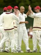 2 September 2005; Andre Botha, North County, second from right, is congratulated by team-mates after he bowled Railway Unions Mohammed Tariq. Irish Senior Cup Final, Railway Union v North County, Castle Avenue, Clontarf, Dublin. Picture credit; Pat Murphy / SPORTSFILE