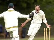 2 September 2005; Roger Whelan, Railway Union, celebrates with team-mate and wicketkeeper James Rogan, left, after he bowled out Andre Botha, North County. Irish Senior Cup Final, Railway Union v North County, Castle Avenue, Clontarf, Dublin. Picture credit; Pat Murphy / SPORTSFILE
