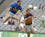 4 September 2005; Benny Hickey, Tipperary, in action against David Murphy, Wexford. Tommy Murphy Cup Final, Wexford v Tipperary, Croke Park, Dublin. Picture credit; Damien Eagers / SPORTSFILE