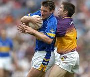 4 September 2005; Stephen Murphy, Tipperary, in action against Paraic Curtis, Wexford. Tommy Murphy Cup Final, Wexford v Tipperary, Croke Park, Dublin. Picture credit; Brendan Moran / SPORTSFILE