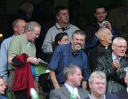 4 September 2005; Sein Fein MP's Gerry Adams, right and Martin McGuinness take their seats for the Armagh v Tyrone match. Tommy Murphy Cup Final, Wexford v Tipperary, Croke Park, Dublin. Picture credit; David Maher / SPORTSFILE