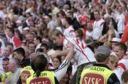 4 September 2005; Stewarts attempt to stop supporters from entering the pitch at the end of the game. Bank of Ireland All-Ireland Senior Football Championship Semi-Final, Armagh v Tyrone, Croke Park, Dublin. Picture credit; David Maher / SPORTSFILE