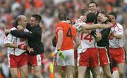 4 September 2005; Tyrone players, including, Peter Canavan, left, who scored the winning point, celebrate at the final whistle. Bank of Ireland All-Ireland Senior Football Championship Semi-Final, Armagh v Tyrone, Croke Park, Dublin. Picture credit; Brendan Moran / SPORTSFILE