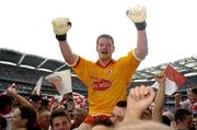 4 September 2005; Tyrone goalkeeper Pascal McConnell held shoulder high surrounded by Tyrone supporters celebrates victory over Armagh. Bank of Ireland All-Ireland Senior Football Championship Semi-Final, Armagh v Tyrone, Croke Park, Dublin. Picture credit; Damien Eagers / SPORTSFILE