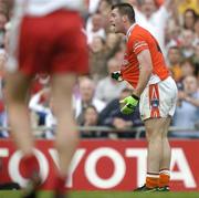 4 September 2005; Ciaran McKeever, Armagh, reacts to the decision by referee Paddy Russell to award Tyrone a last minute free kick against him which resulted in the winning score by Peter Canavan. Bank of Ireland All-Ireland Senior Football Championship Semi-Final, Armagh v Tyrone, Croke Park, Dublin. Picture credit; Brendan Moran / SPORTSFILE