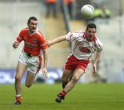 4 September 2005; Michael McGee, Tyrone, in action against Oisin McConville, Armagh. Bank of Ireland All-Ireland Senior Football Championship Semi-Final, Armagh v Tyrone, Croke Park, Dublin. Picture credit; Damien Eagers / SPORTSFILE