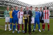 10 March 2014;  FAI Junior Cup Ambassador Ray Houghton at the quarter-final draw for the FAI Junior Cup with club captains, from left, James Walsh, St. Michaels FC, Mark Keane, Carew Park FC, Dean Carpenter, Collinstown FC, Ger Cheevers, NUI Galway FC, Dave Doyle, Sheriff YC, Kenneth Roche, Liffey Wanderers FC, Stephen McNamara, Ballynanty Rovers FC, and Paul Danagher, Geraldines FC. FAI Junior Cup Quarter-Final Draw, Aviva Stadium, Lansdowne Road, Dublin. Photo by Sportsfile