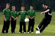 31 August 2005; Shelbourne player Jason Byrne, shows off some techniques to Clonmel  U12 players, from left, Jason Clarke, Dean O'Mahoney, Keith Browne and Aidan McGrath, as the Clonmel Town U12 take a final training session before they depart to represent Ireland at the World Finals of the Danone Nations Cup at the Gerland Stadium in Lyon, home to Olympic Lyonnais. AUL Complex, Clonshaugh, Dublin. Picture credit; David Maher / SPORTSFILE