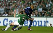7 September 2005; theirry Henry, France, is tackled by Richard Dunne, Republic of Ireland. FIFA 2006 World Cup Qualifier, Group 4, Republic of Ireland v France, Lansdowne Road, Dublin. Picture credit; Brendan Moran / SPORTSFILE