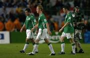 7 September 2005; Dejected Republic of Ireland players, from left, Andy Reid, Damien Duff and Robbie Keane leave the field after defeat by France. FIFA 2006 World Cup Qualifier, Group 4, Republic of Ireland v France, Lansdowne Road, Dublin. Picture credit; Brendan Moran / SPORTSFILE