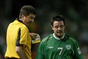 7 September 2005; Andy Reid, Republic of Ireland, walks away after receiving a yellow card from referee Herbert Fandel. FIFA 2006 World Cup Qualifier, Group 4, Republic of Ireland v France, Lansdowne Road, Dublin. Picture credit; Brendan Moran / SPORTSFILE