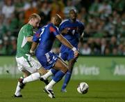 7 September 2005; Jean Alain Boumsong, France, in action against Gary Doherty, Republic of Ireland. FIFA 2006 World Cup Qualifier, Group 4, Republic of Ireland v France, Lansdowne Road, Dublin. Picture credit; Brendan Moran / SPORTSFILE