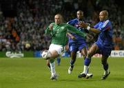 7 September 2005; Stephen Carr, Republic of Ireland, in action against William Gallas (5) and Jean Alain Boumsong, France. FIFA 2006 World Cup Qualifier, Group 4, Republic of Ireland v France, Lansdowne Road, Dublin. Picture credit; Brendan Moran / SPORTSFILE