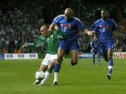 7 September 2005; Stephen Carr, Republic of Ireland, in action against Jean Alain Boumsong, France. FIFA 2006 World Cup Qualifier, Group 4, Republic of Ireland v France, Lansdowne Road, Dublin. Picture credit; Brendan Moran / SPORTSFILE