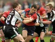 10 September 2005; Trevor Halstead, Munster, is tackled by David Bishop,13, Neath-Swansea Ospreys. Celtic League 2005-2006, Group A, Munster v Neath-Swansea Ospreys, Musgrave Park, Cork. Picture credit; Matt Browne / SPORTSFILE