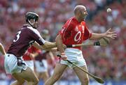 11 September 2005; Brian Corcoran, Cork, in action against Tony Og Regan, Galway. Guinness All-Ireland Senior Hurling Championship Final, Galway v Cork, Croke Park, Dublin. Picture credit; Brendan Moran / SPORTSFILE *** Local Caption *** Any photograph taken by SPORTSFILE during, or in connection with, the 2005 Guinness All-Ireland Hurling Final which displays GAA logos or contains an image or part of an image of any GAA intellectual property, or, which contains images of a GAA player/players in their playing uniforms, may only be used for editorial and non-advertising purposes.  Use of photographs for advertising, as posters or for purchase separately is strictly prohibited unless prior written approval has been obtained from the Gaelic Athletic Association.
