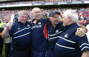 11 September 2005; Members of the Cork management, from left, Patsy Morrissey, selector, John Allen, manager, Joe O'Leary, selector and Fred Sheedy, selector, celebrate after the final whistle. Guinness All-Ireland Senior Hurling Championship Final, Galway v Cork, Croke Park, Dublin. Picture credit; Brendan Moran / SPORTSFILE *** Local Caption *** Any photograph taken by SPORTSFILE during, or in connection with, the 2005 Guinness All-Ireland Hurling Final which displays GAA logos or contains an image or part of an image of any GAA intellectual property, or, which contains images of a GAA player/players in their playing uniforms, may only be used for editorial and non-advertising purposes.  Use of photographs for advertising, as posters or for purchase separately is strictly prohibited unless prior written approval has been obtained from the Gaelic Athletic Association.