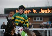 11 March 2014; Jezki, with Barry Geraghty up, is led into the winners enclosure after victory in the Stan James Champion Hurdle Challenge Trophy. Cheltenham Racing Festival 2014. Prestbury Park, Cheltenham, England. Picture credit: Ramsey Cardy / SPORTSFILE