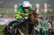 12 March 2014; Kid Cassidy, with Tony McCoy up, during the BetVictor Queen Mother Champion Chase. Cheltenham Racing Festival 2014. Prestbury Park, Cheltenham, England. Picture credit: Ramsey Cardy / SPORTSFILE