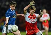 12 March 2014; Kevin Bouchier, Cavan, in action against Fergal Duffin, Derry. Cadbury Ulster GAA Football U21 Championship, Preliminary Round, Derry v Cavan, Celtic Park , Derry. Picture credit: Oliver McVeigh / SPORTSFILE