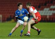 12 March 2014; Dara McVitty, Cavan, in action against Ciaran McFaul, Derry. Cadbury Ulster GAA Football U21 Championship, Preliminary Round, Derry v Cavan, Celtic Park , Derry. Picture credit: Oliver McVeigh / SPORTSFILE