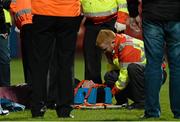 12 March 2014; Declan Brown, Derry, is attended to by medical staff after receiving an early injury to the neck, with lead to him leaving the field. Cadbury Ulster GAA Football U21 Championship, Preliminary Round, Derry v Cavan, Celtic Park , Derry. Picture credit: Oliver McVeigh / SPORTSFILE
