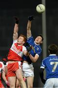 12 March 2014; Michael Argue, Cavan, in action against Conor McAtamney, Derry. Cadbury Ulster GAA Football U21 Championship, Preliminary Round, Derry v Cavan, Celtic Park , Derry. Picture credit: Oliver McVeigh / SPORTSFILE