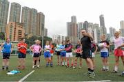 13 March 2014; The coach of the TG4 Ladies Allstar squads, William O'Sullivan, Kerry, speaks to the players before the squad training session at the Hong Kong Football Club. 2014 TG4 Ladies Football All-Star Tour, Hong Kong, China. Picture credit: Brendan Moran / SPORTSFILE